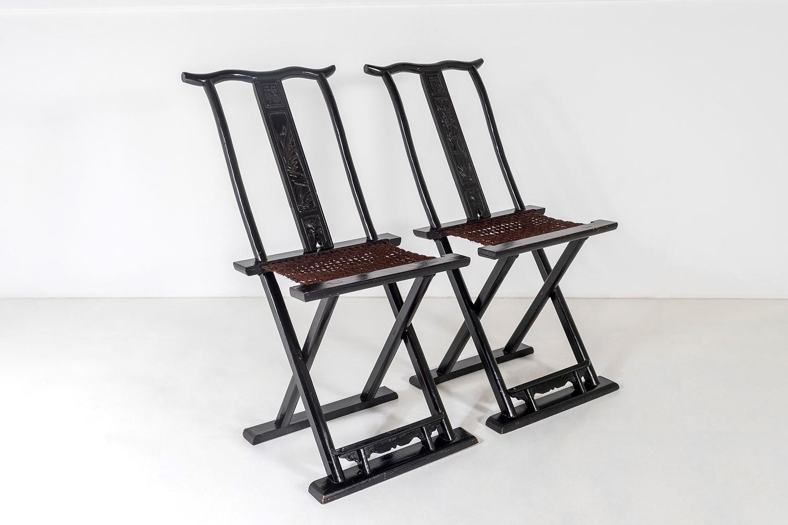 A characterful pair of  late 19th Century, early 20th Century Chinese Folding Travel Chairs.  Great form and colour, with ebonised frames and original woven nett seats.
A simplistic, yet highly decorative pair with good geometry, well made with