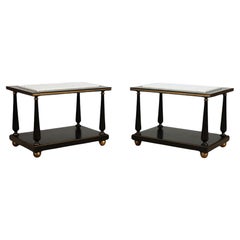 Vintage A pair of ebonized and gilt marble top end tables on ball feet circa 1950.
