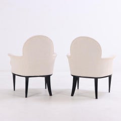 Pareja de sillones ebonizados y tapizados, C. 1950.