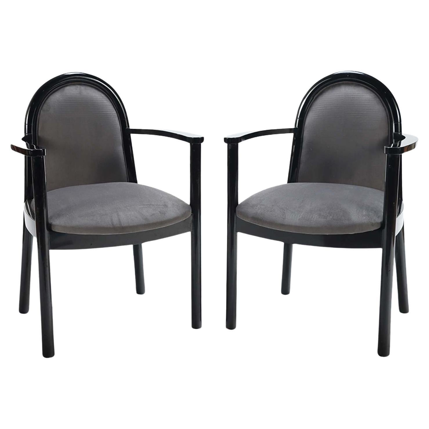 A pair of ebonized Italian armchairs circa 1980 with new fabric.  For Sale