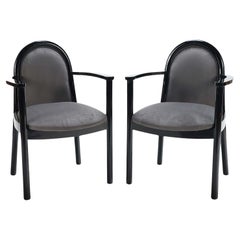 Vintage A pair of ebonized Italian armchairs circa 1980 with new fabric. 