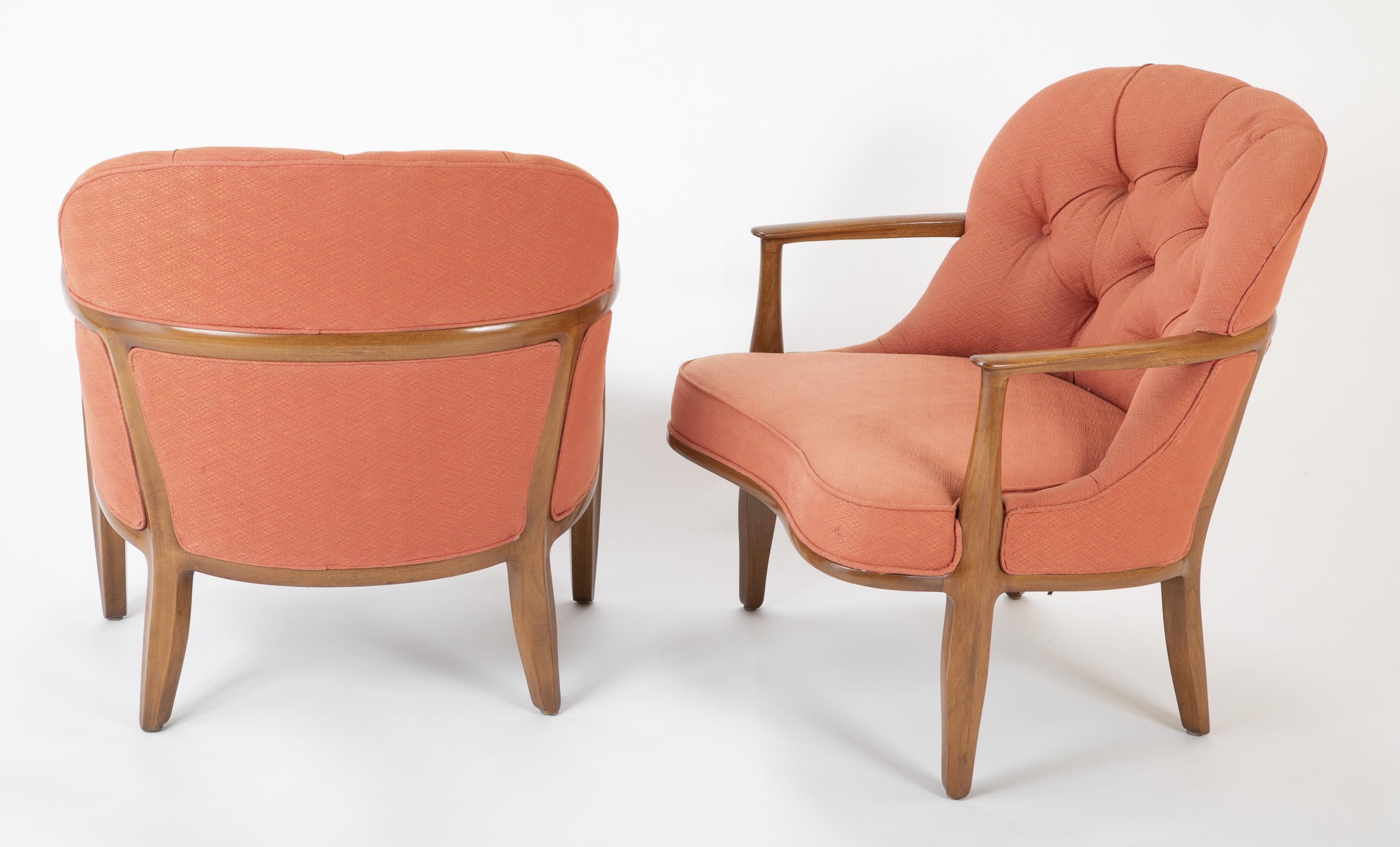 A pair of model 5705 walnut armchairs designed by Edward Wormley for Dunbar. Part of what many consider to be Wormley’s finest collection of furniture, mid-20th century.