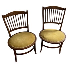 Paire de chaises de salon édouardiennes anciennes en acajou à base ovale