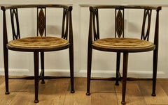 Pair of Edwardian Circular Arm Chairs