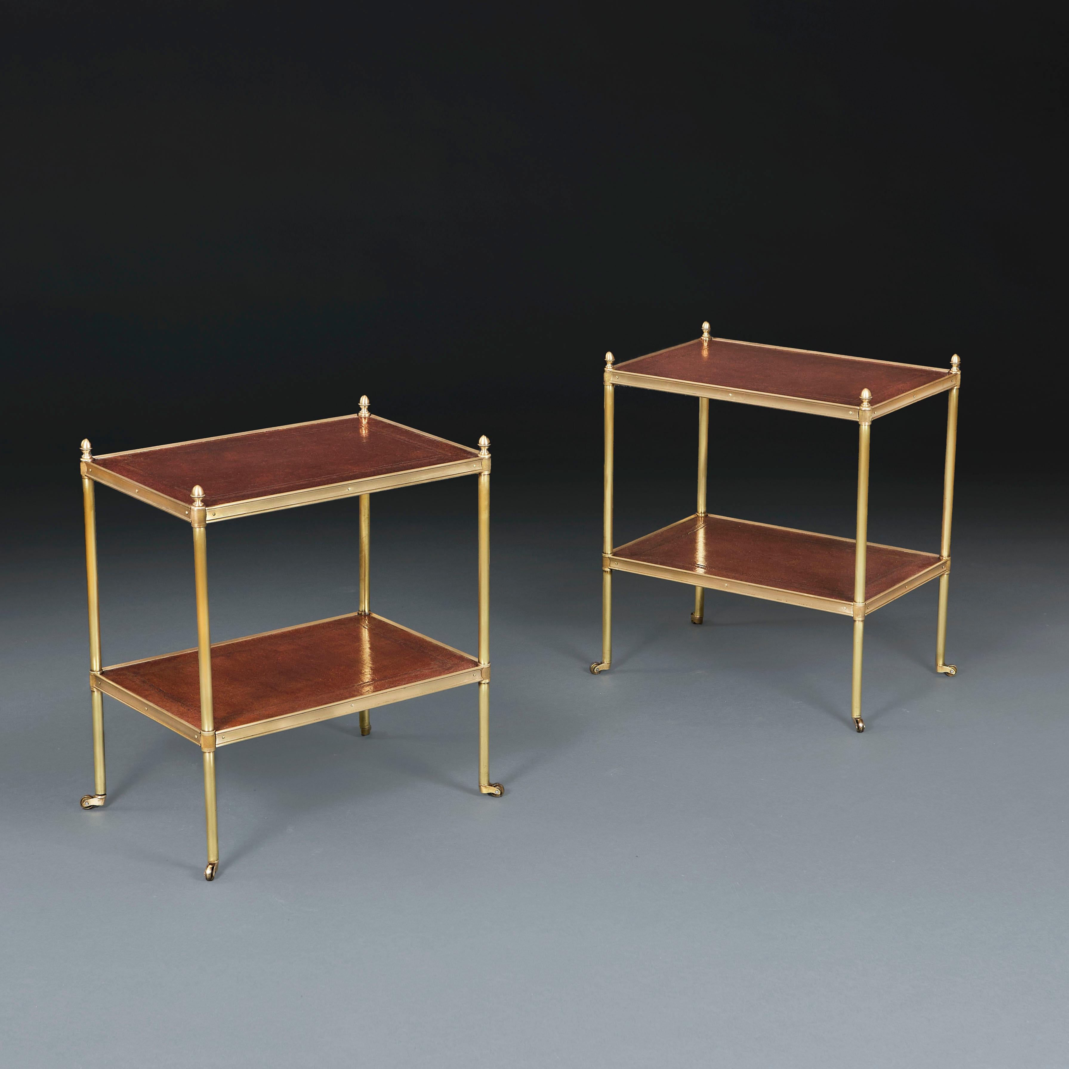 England, circa 1920

A pair of Edwardian brass etageres with leather tops, with gilt tooling to the borders, the uprights surmounted by acorn finials and terminating in brass castors.

Height 53.00cm
Width 47.00cm
Depth 31.00cm

