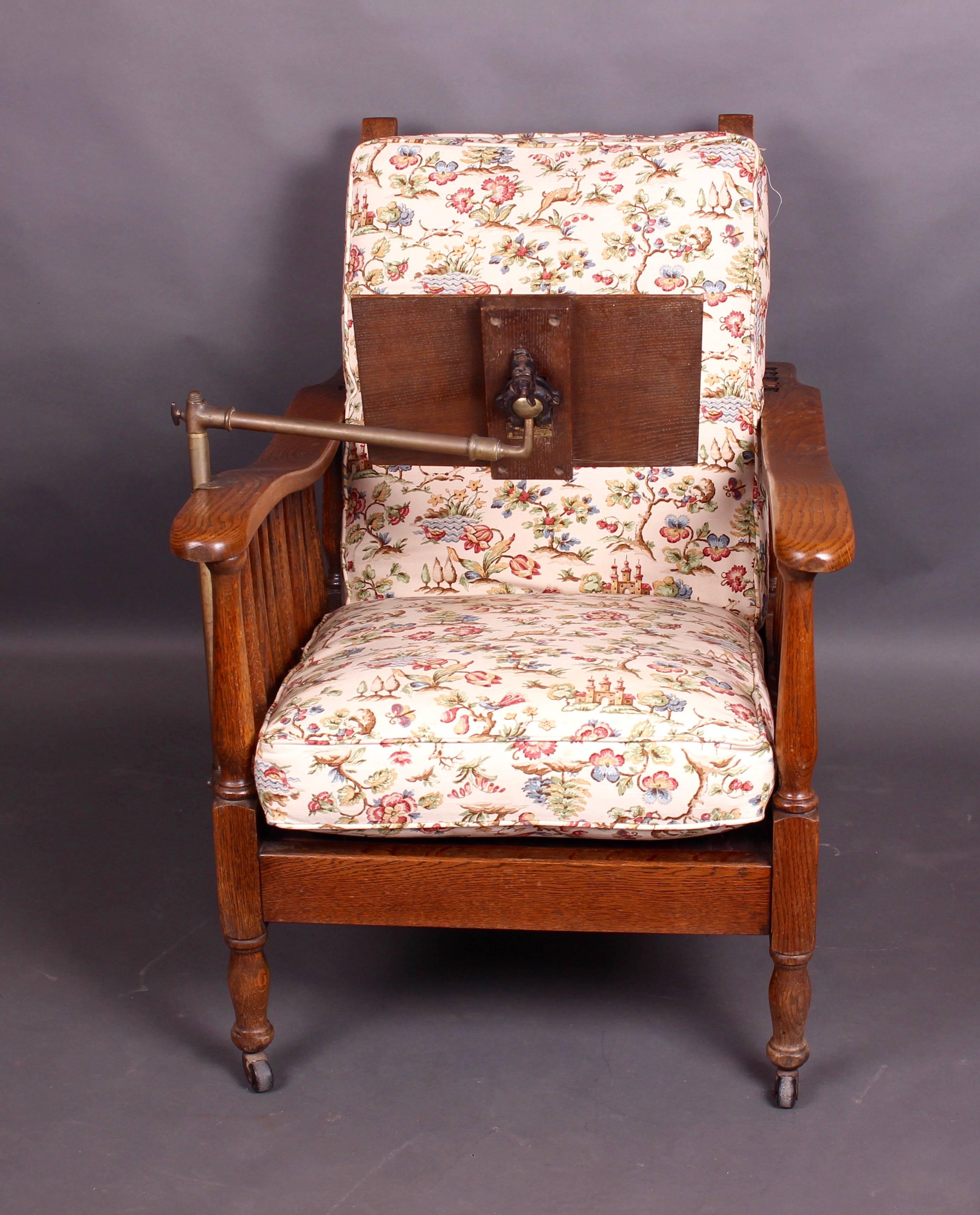 English Pair of Edwardian Oak Steamer Chairs, One with a Carters Patent Reading Stand