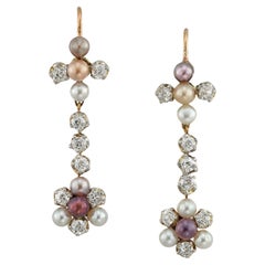 A Pair Of Edwardian Pearl And Diamond Earrings