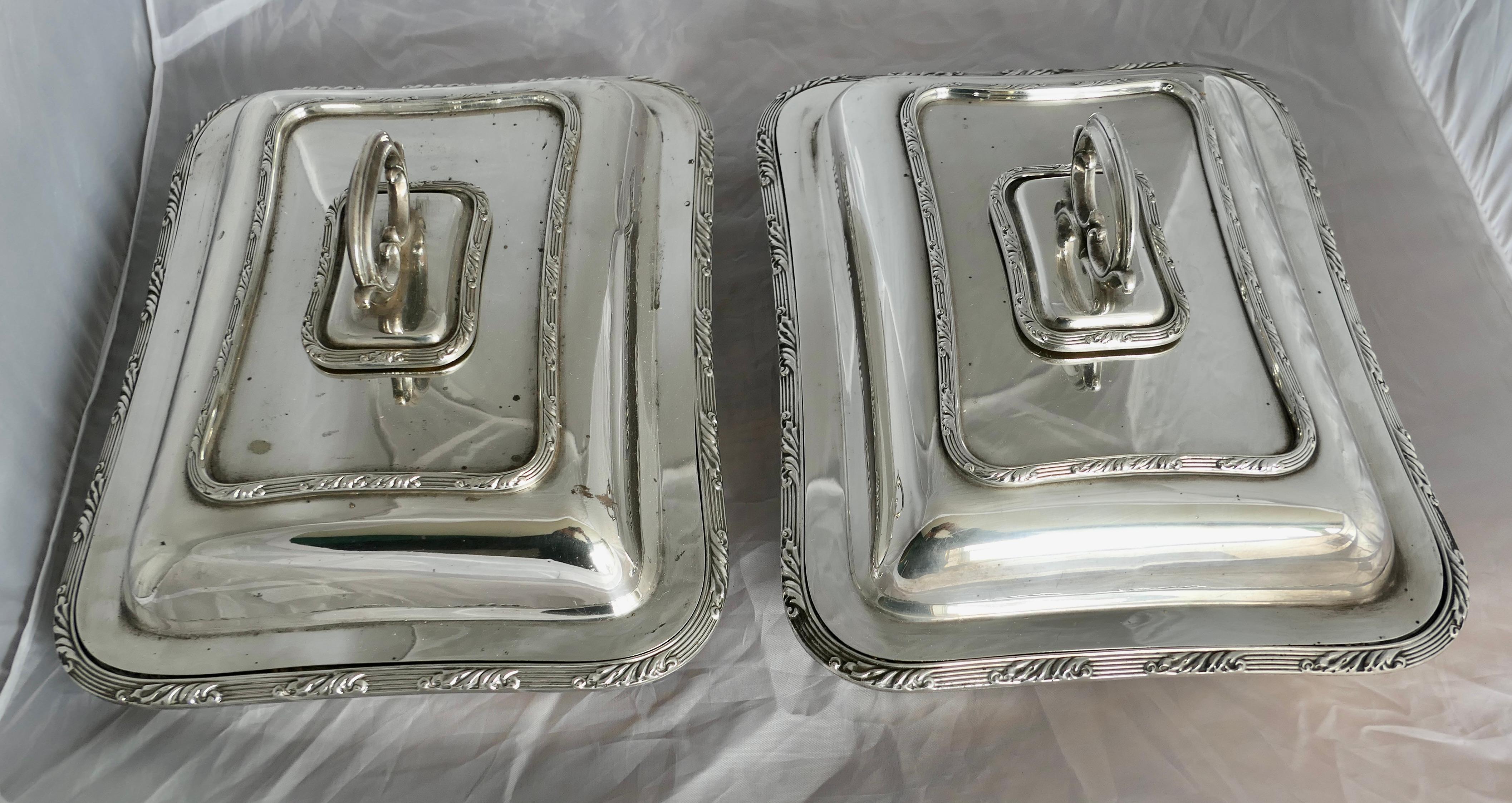 A Pair of Edwardian Silver Plated Entree Dishes by Hukin and Heath


A Pair of antique Edwardian silver plated entree dishes in quality silver plate these  rectangular entree dishes have removable lids and  handles.

The underside is fully marked