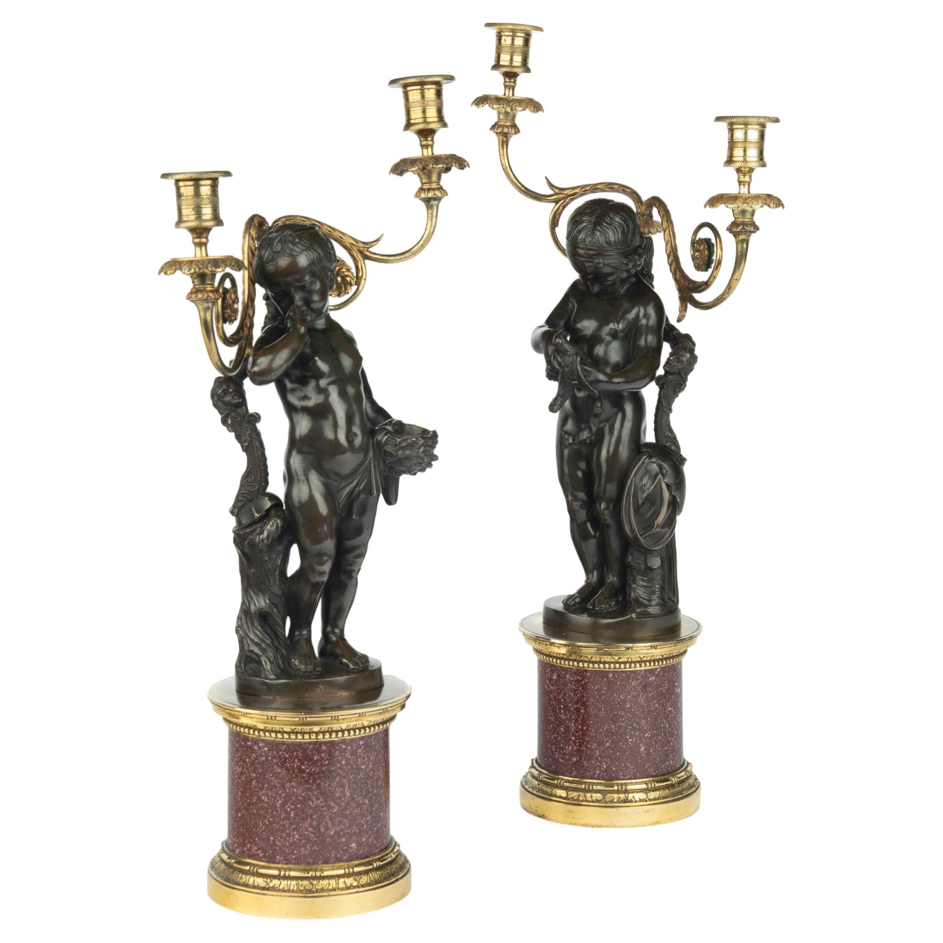 A pair of Egyptian porphyry and bronze candelabra after Charles-Antoine Bridan For Sale