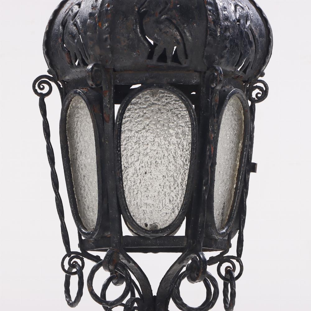 A pair of elaborate Italian wrought iron hanging lanterns C 1920. In Good Condition For Sale In Philadelphia, PA
