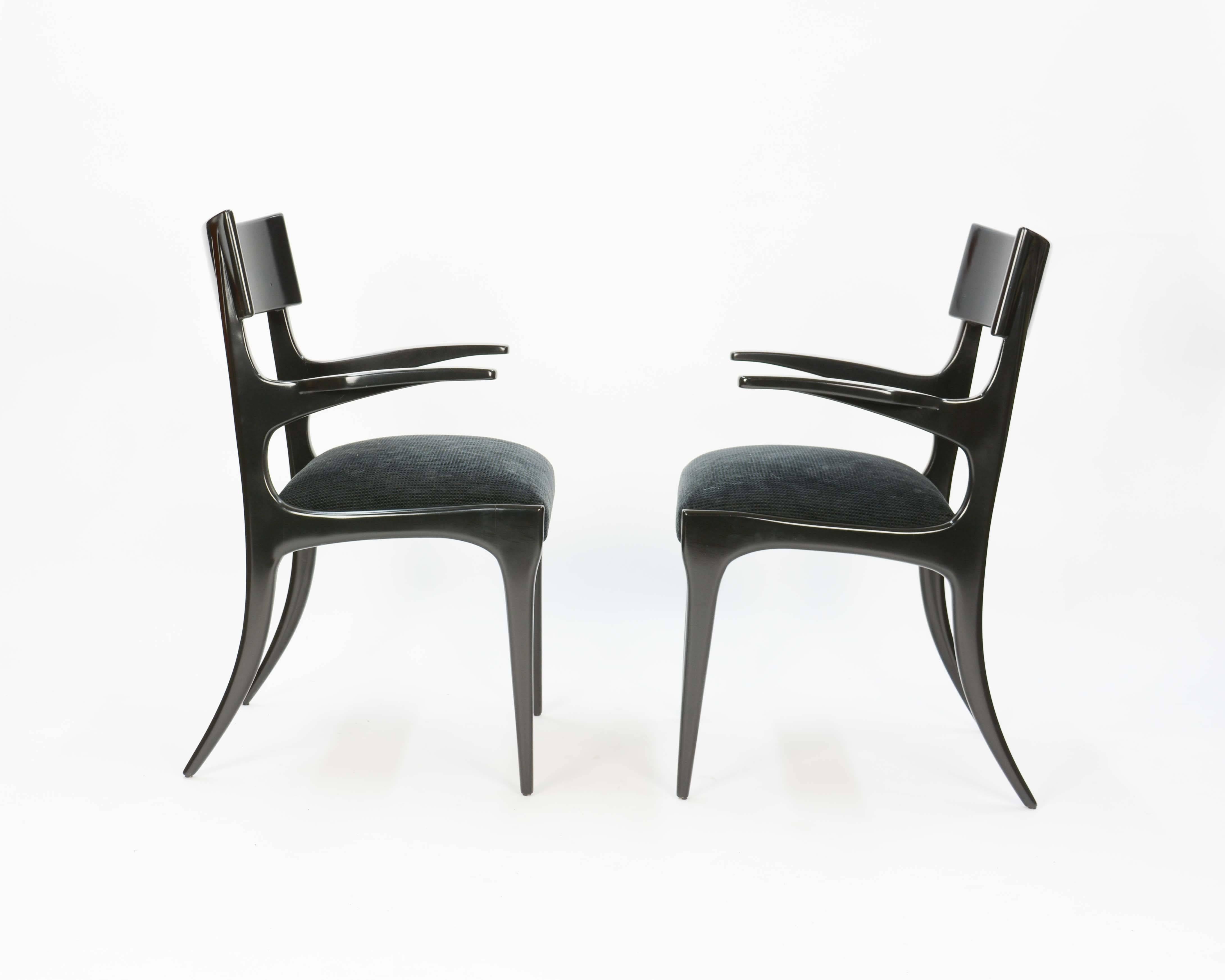 These sculpted beauties are elegant in form and function. They have the lines of Robsjohn-Gibbings early work for his show room on Madison Ave pre-WWII. The flaired legs and tapered arms speak to the refined on design from a European Master like