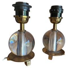 A pair of elegant Art Déco "Boule" table lamps in the style of J.Adnet. France.