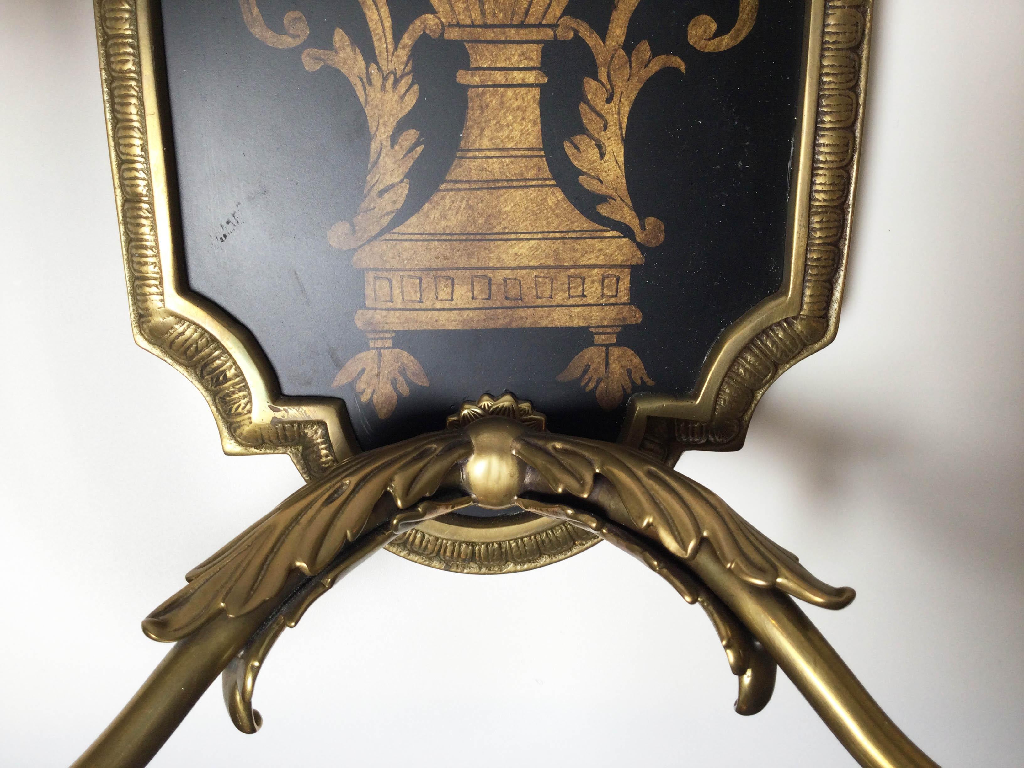 A Pair of Elegant Cast Brass and Wood Panel Two Light Sconces In Excellent Condition In Lambertville, NJ