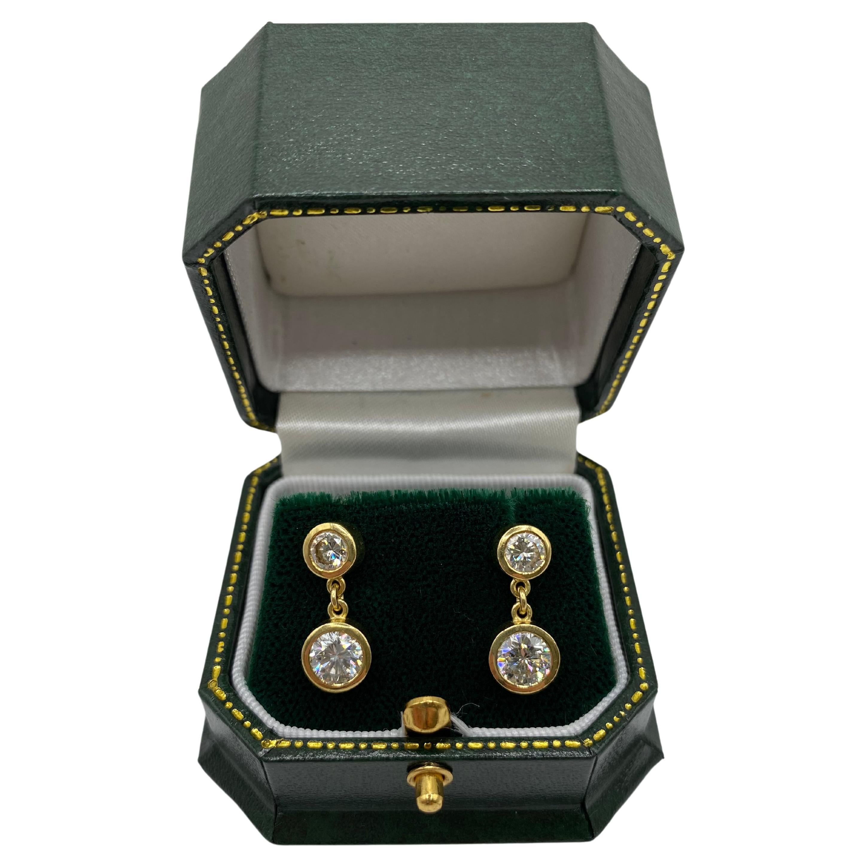 A Pair of Elegant Double Drop Diamond Earrings