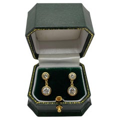 A Pair of Elegant Double Drop Diamond Earrings