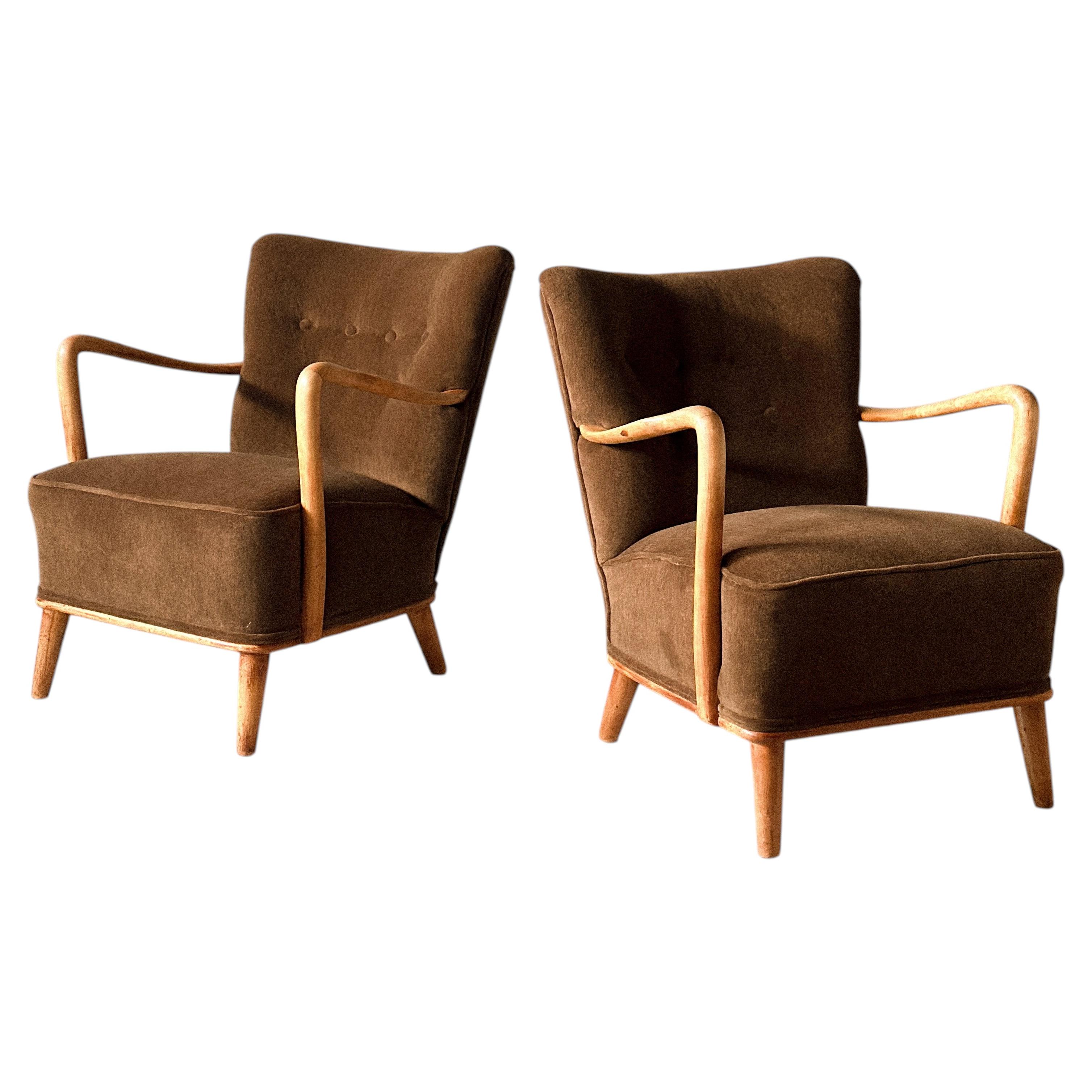 A Pair of Elegant Mid-Century Swedish Armchairs, circa 1950s