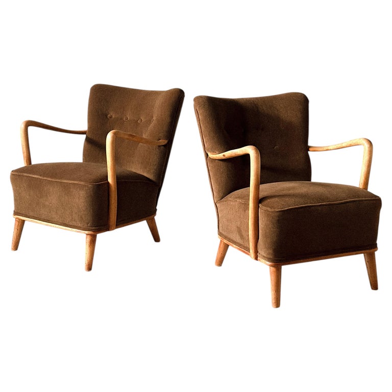 A Pair of Elegant Mid-Century Swedish Armchairs, circa 1950s