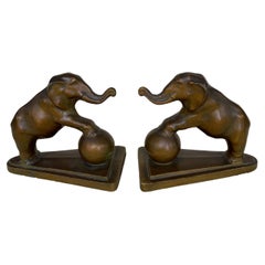 A Pair of Elephant Bookends, Signed and Dated 1929