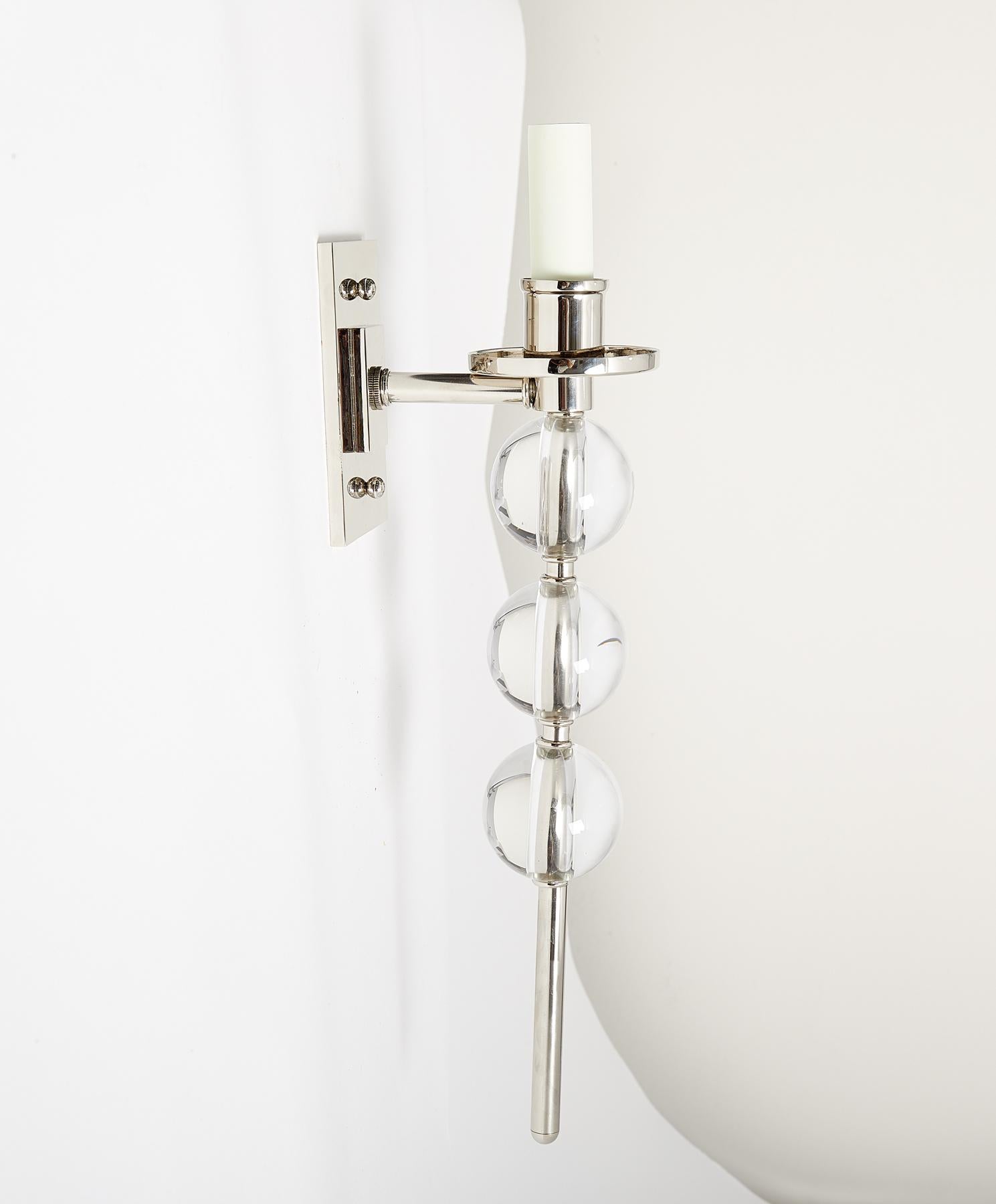 A pair of our custom-designed Ephorus sconces with over-scaled Murano glass balls, polished nickel finish, rectangular backplates, and elongated center rod. Also available in brass, and with rock crystal balls. One candelabra socket per