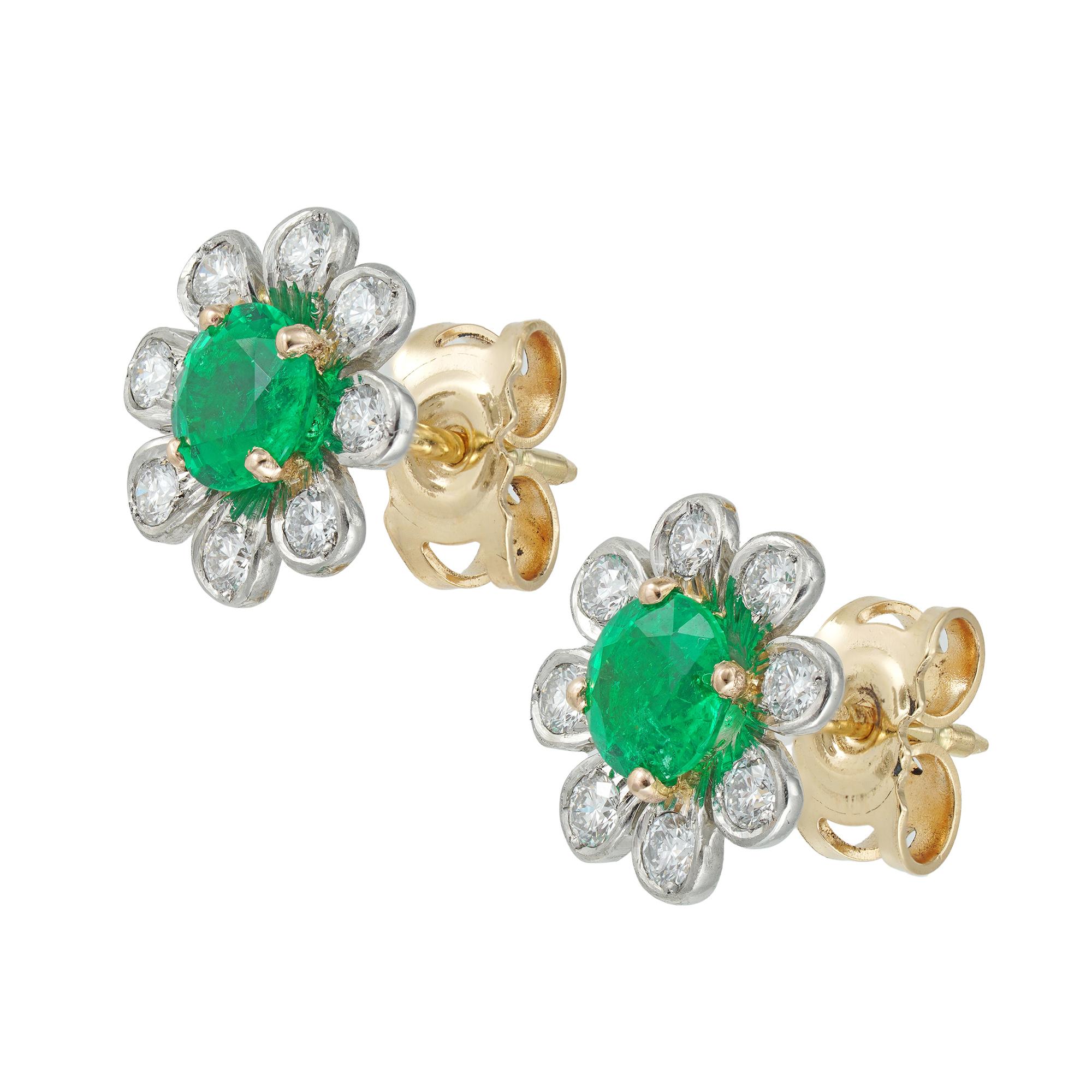A pair of emerald and diamond cluster earrings, each earring if the form of a flower-head, centrally set with a round faceted emerald four claw-set in yellow gold, surrounded by eight platinum petals, each petal set with a round brilliant-cut