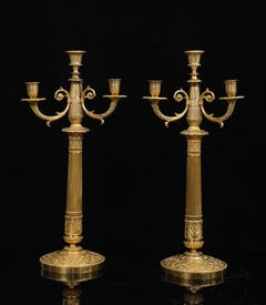 A Pair of Empire Dore Bronze Four-Light Candelabra