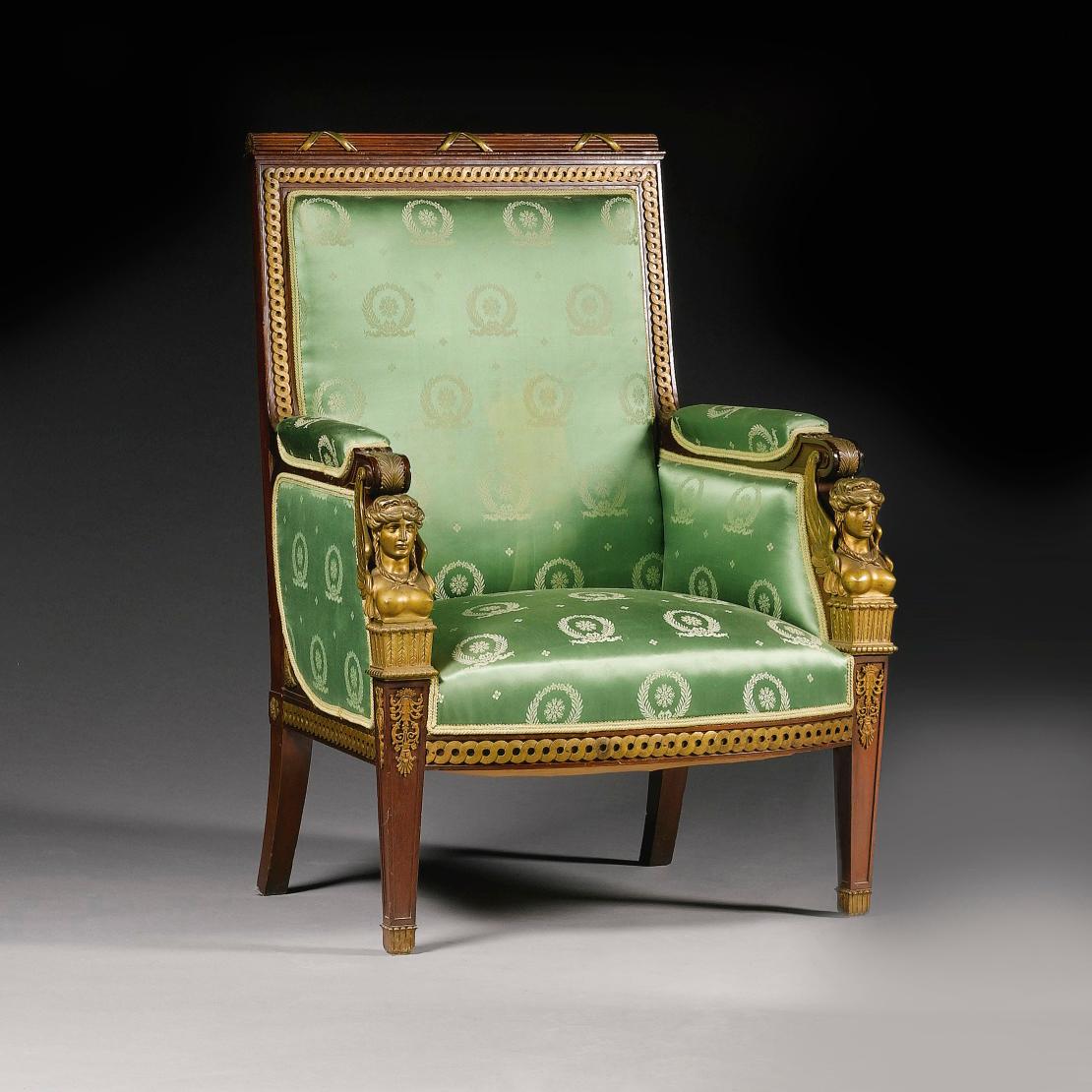 A Fine Pair of Mahogany And Gilt-Bronze Bergères in the Manner of Jacob-Desmalter. The Bergères each having armrests headed by finely cast caryatid herms.     

French, Circa 1880.
