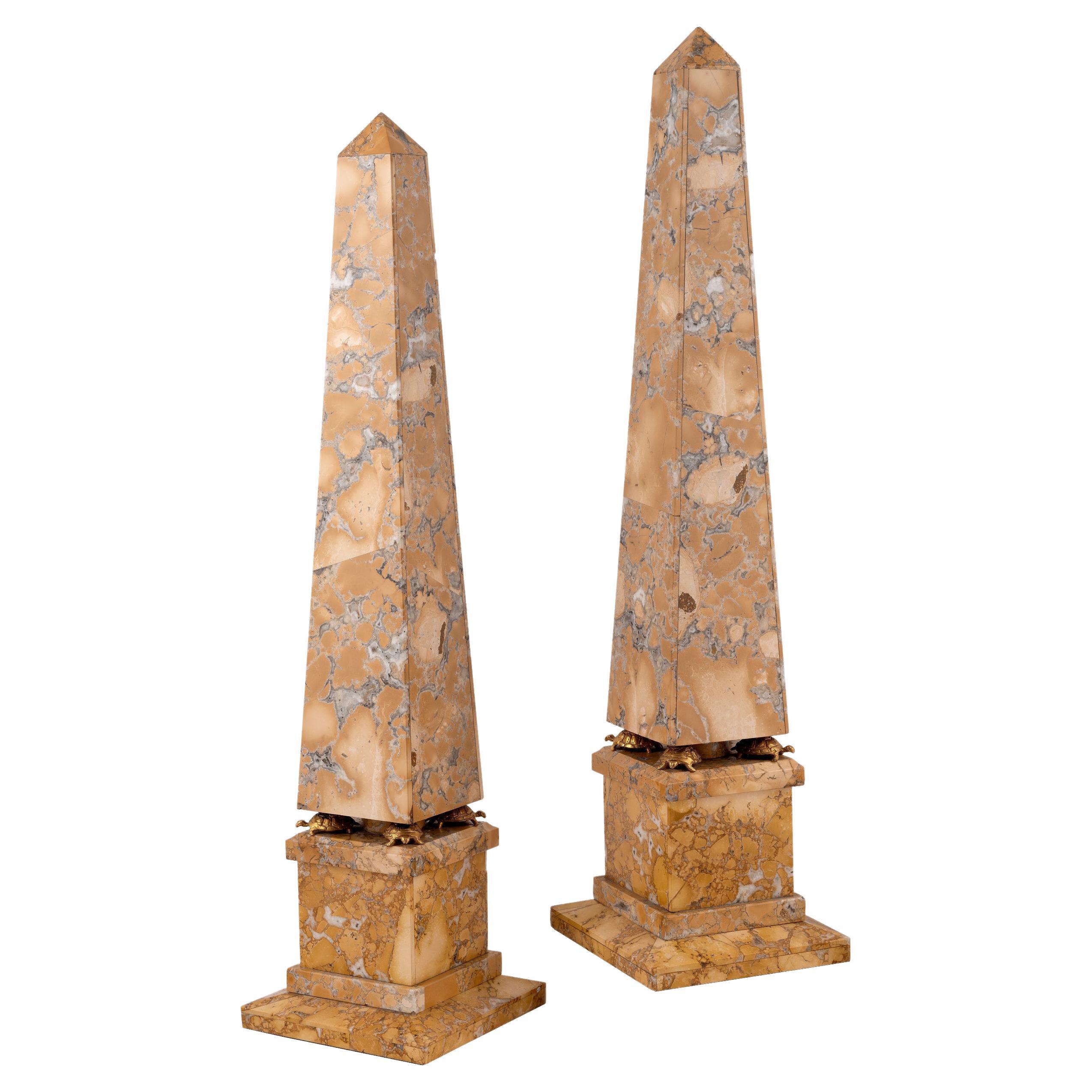 A Pair Of Empire Style Gilt Bronze Mounted Marble Obelisks On Stands For Sale