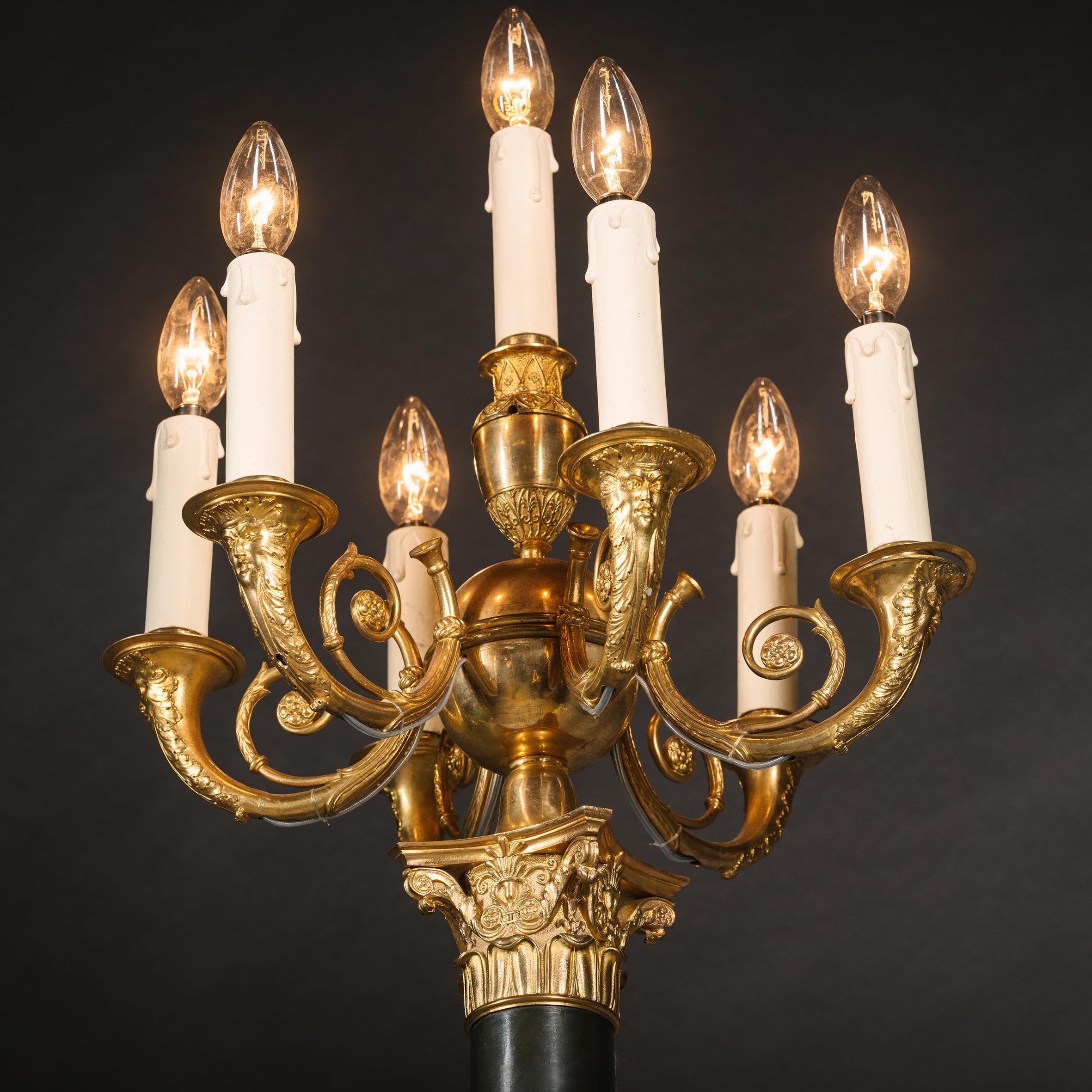 Patinated Pair of Empire Style Seven-Light Candelabra For Sale