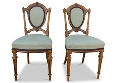 A Pair of Empire Walnut Salon Chairs, Each With Floral Carved Detailing