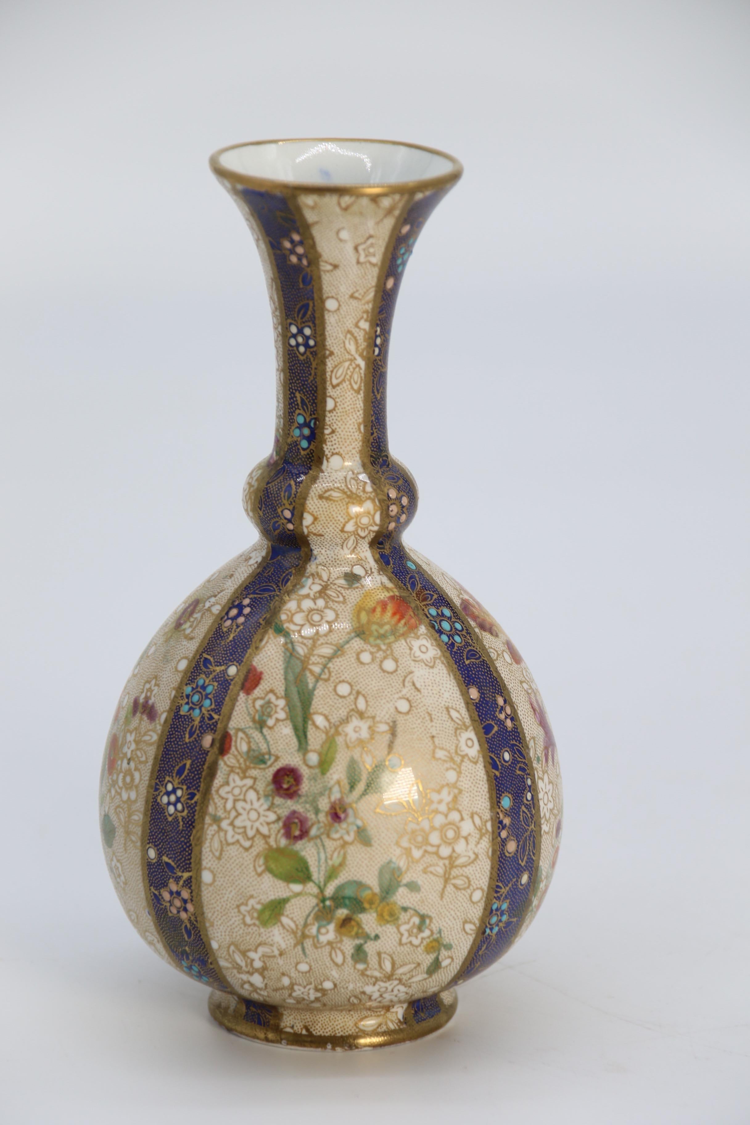 A pair of English early Carlton Ware enamelled and gilt floral vases, circa 1900 3