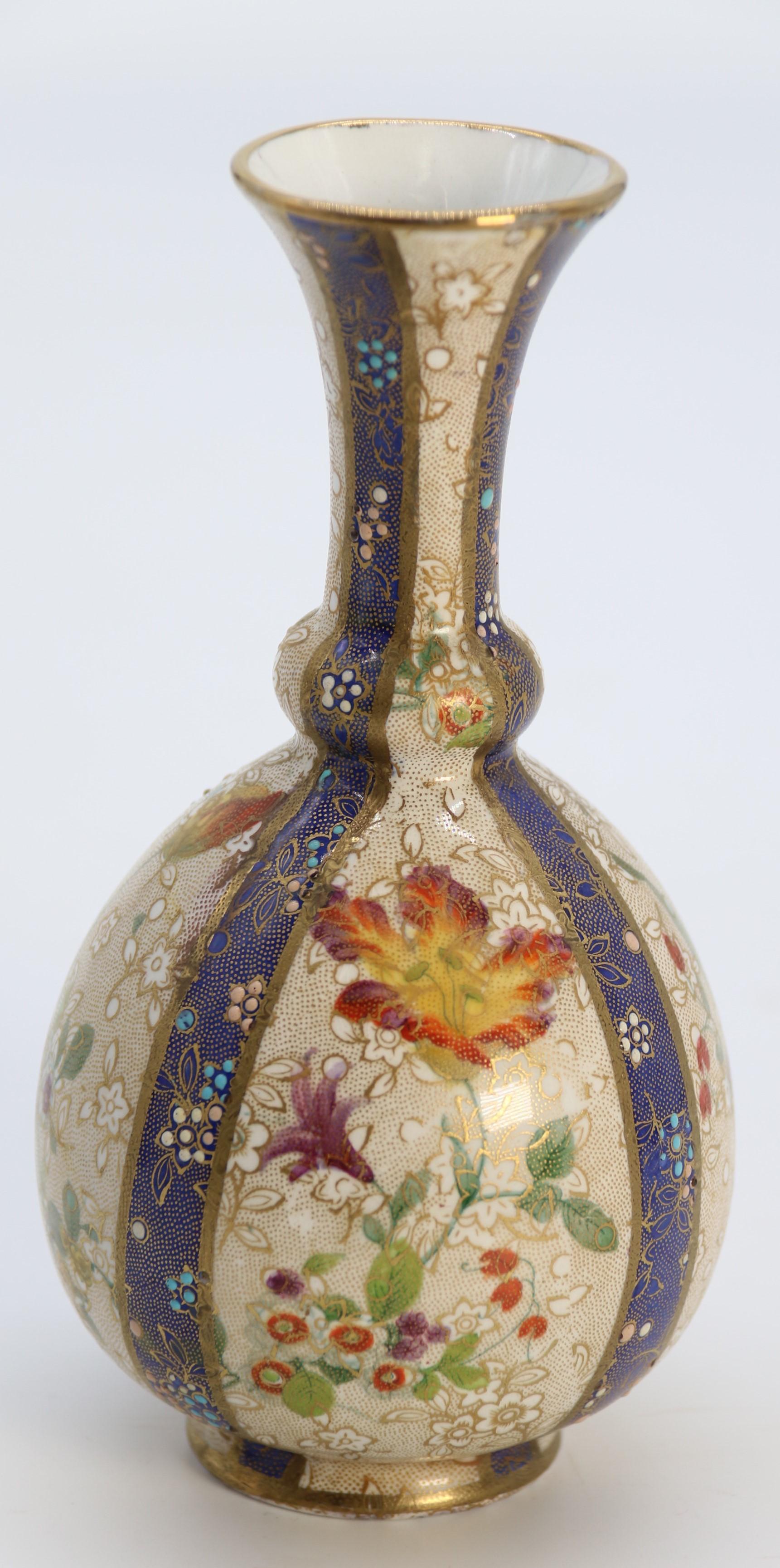 A pair of English early Carlton Ware enamelled and gilt floral vases, circa 1900 11
