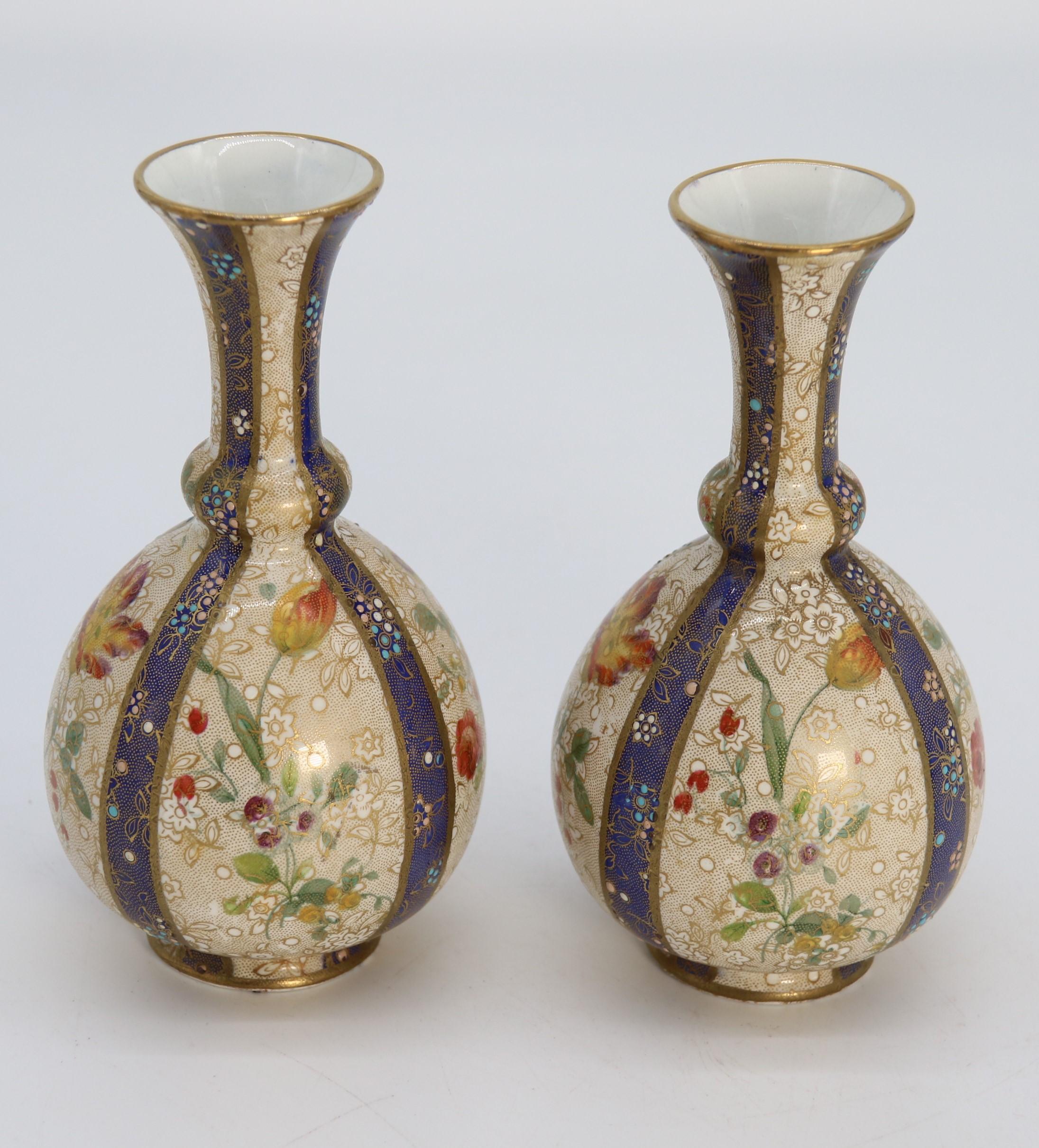 20th Century A pair of English early Carlton Ware enamelled and gilt floral vases, circa 1900
