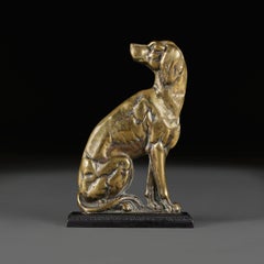 A Pair of English Edwardian Brass Cast Dog Doorstops