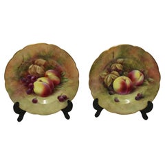 A Pair of English hand painted fruit plates by R Budd Worcester