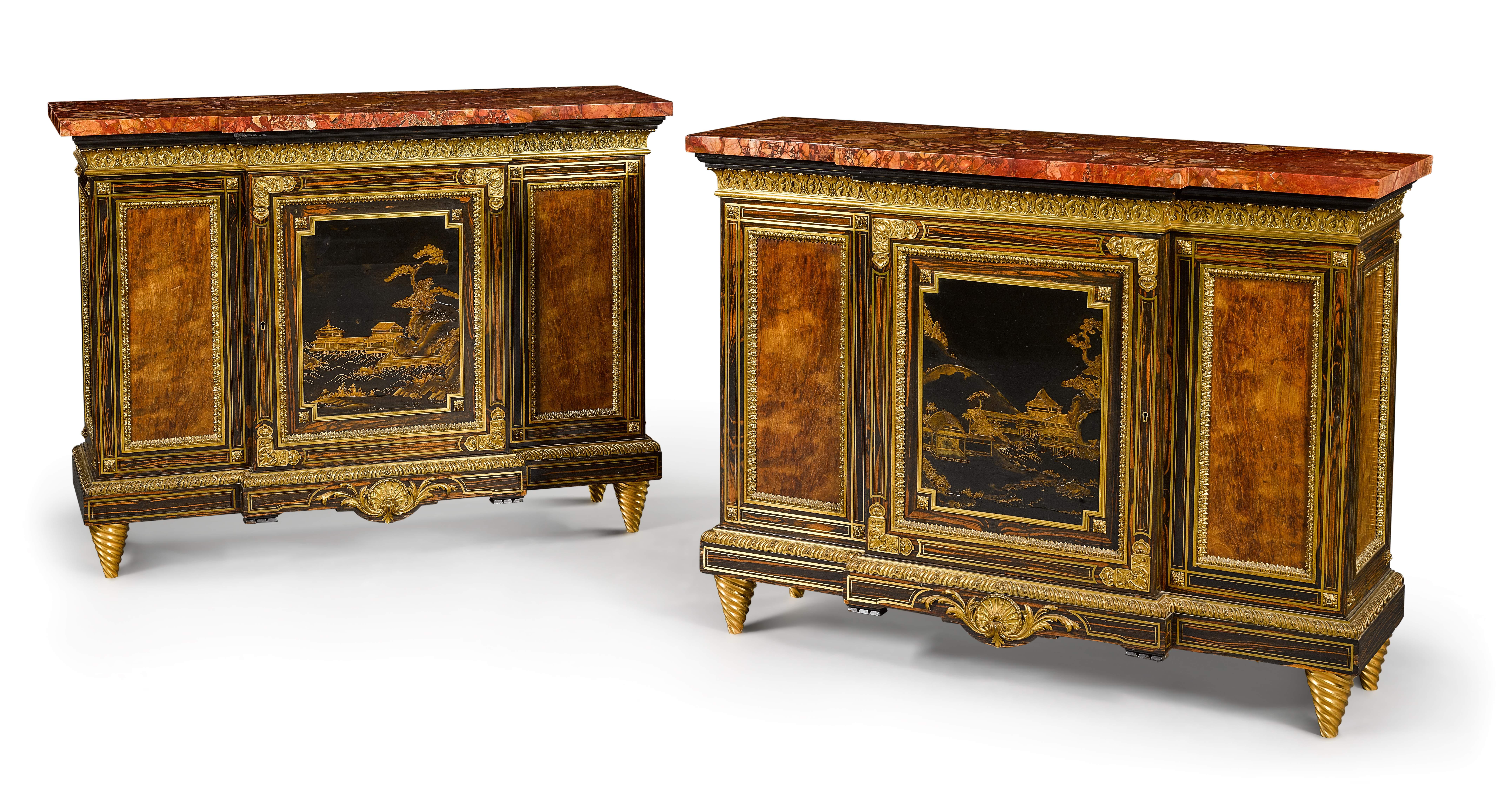 A pair of Louis XIV style gilt-bronze mounted calamander breakfront side cabinets, the Algerian brèche sanguine marble tops above a cupboard door incorporating Japanese lacquer panels, Edo period 17th century, opening to reveal a single adjustable