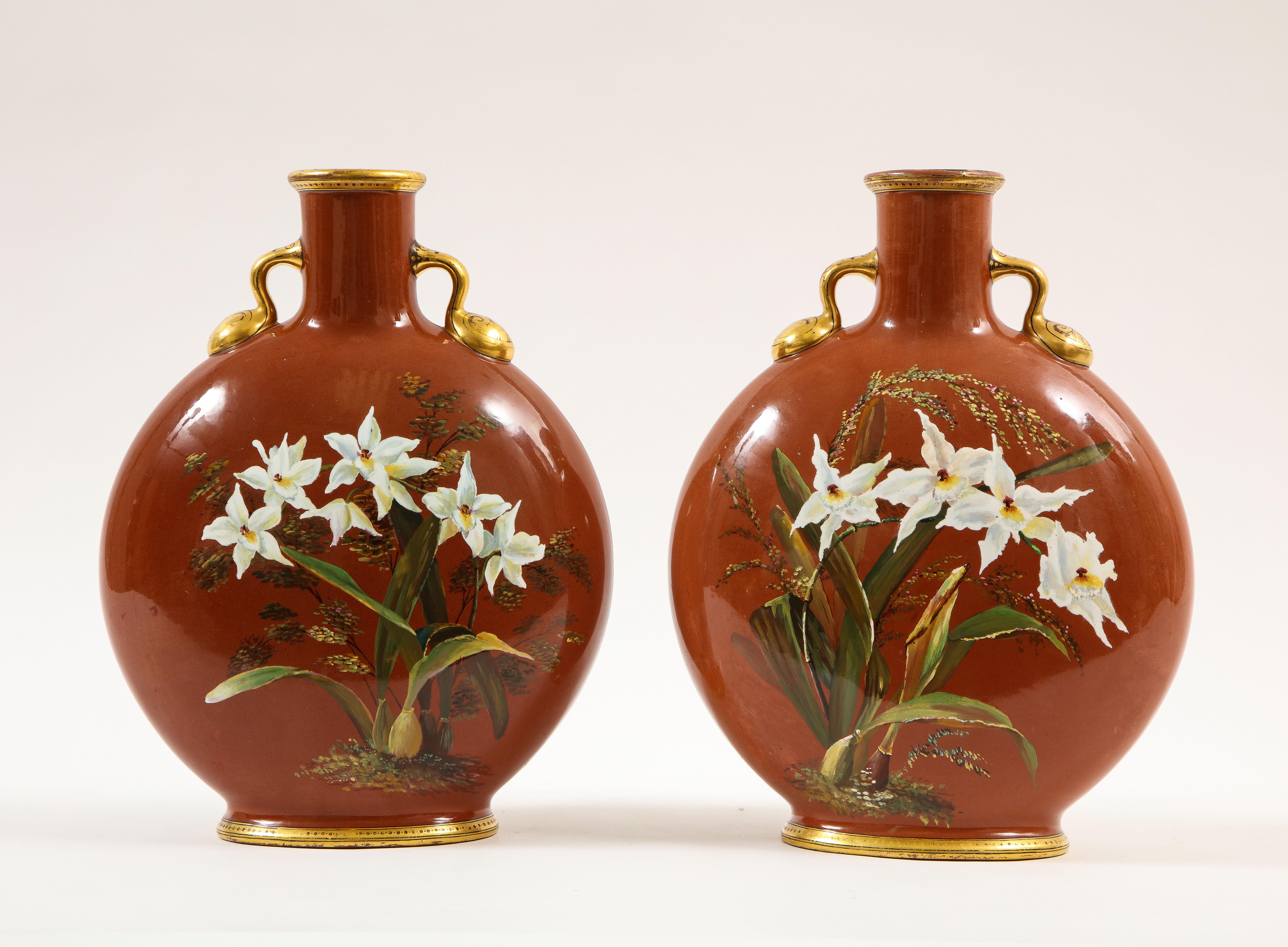 Hand-Painted Pair of English Mintons Coral Ground Floral Motif Moon Flasks with Gilding For Sale
