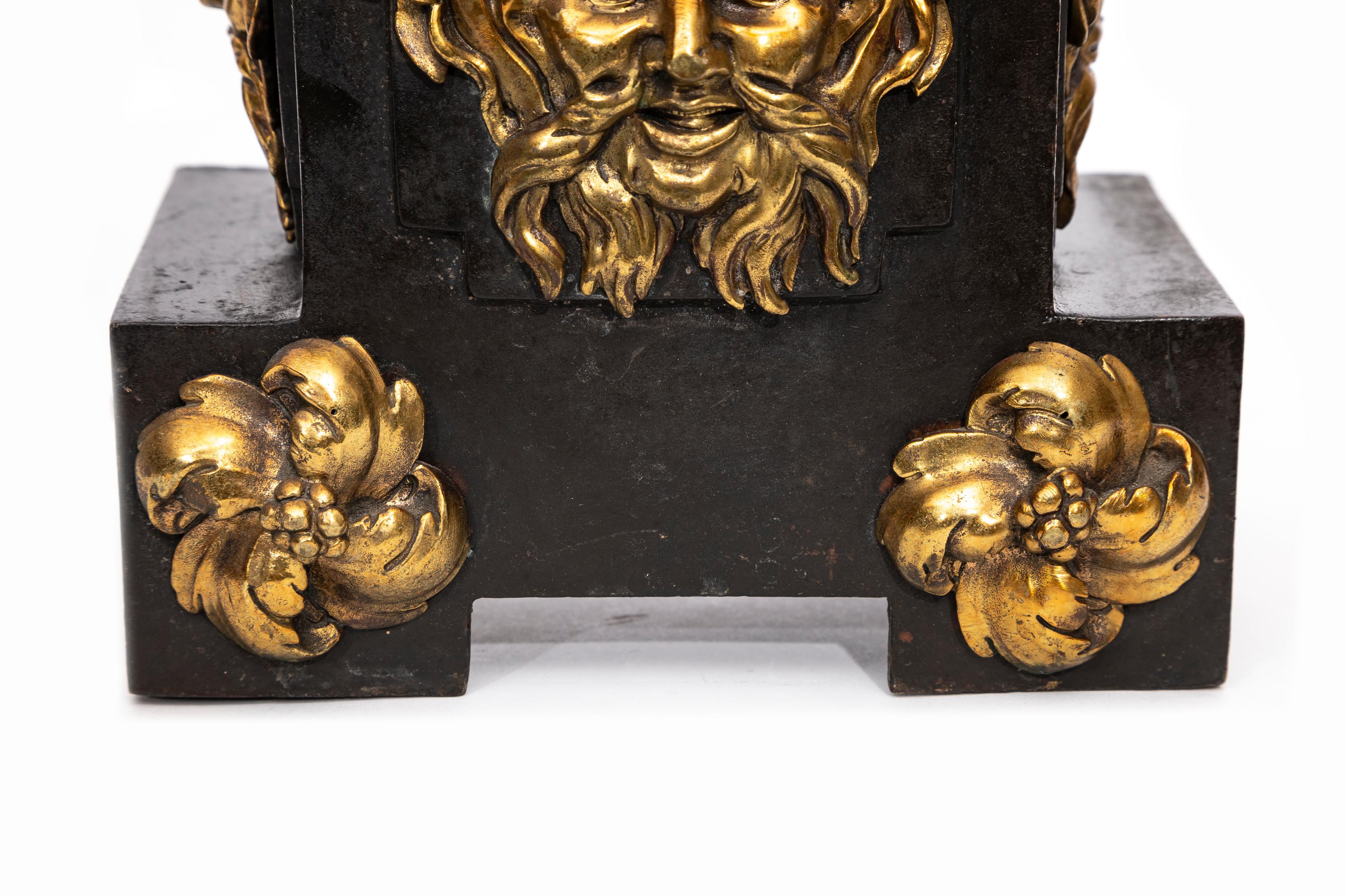 A Pair of English Regency Patinated and Ormolu Rams Head Andirons For Sale 5