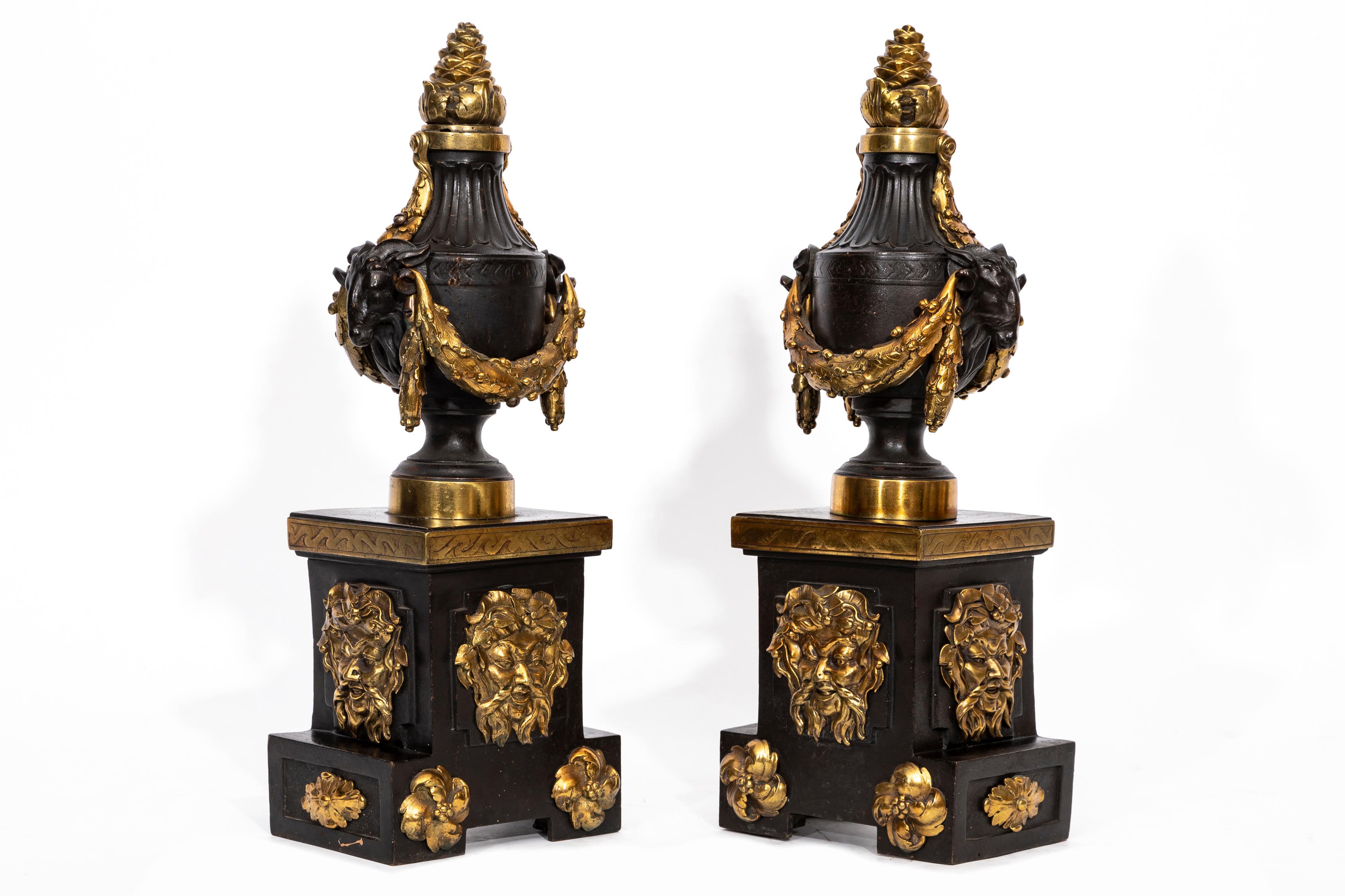 A Pair of English Regency Patinated and Ormolu Rams Head Andirons In Good Condition For Sale In New York, NY