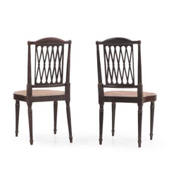 Coppia di sedie laterali decorate in stile Reggenza inglese, XIX sec.