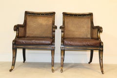 Pair of English Regency Style Ebonized and Gilt Library Chairs