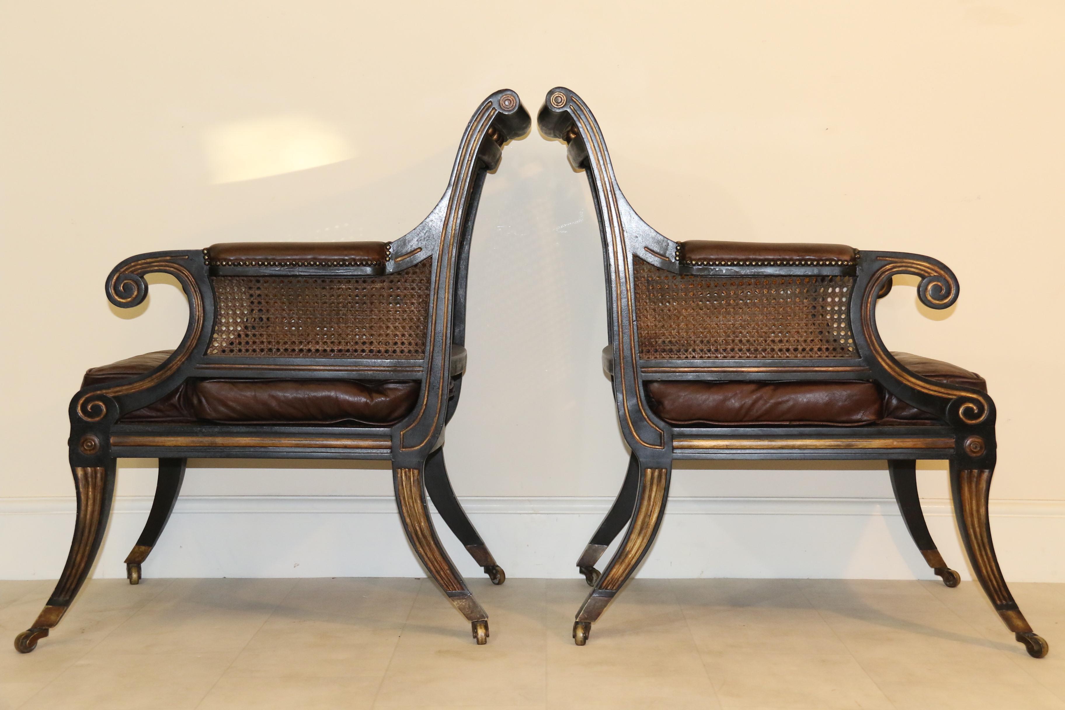 Mahogany Pair of English Regency Style Ebonized and Gilt Library Chairs For Sale