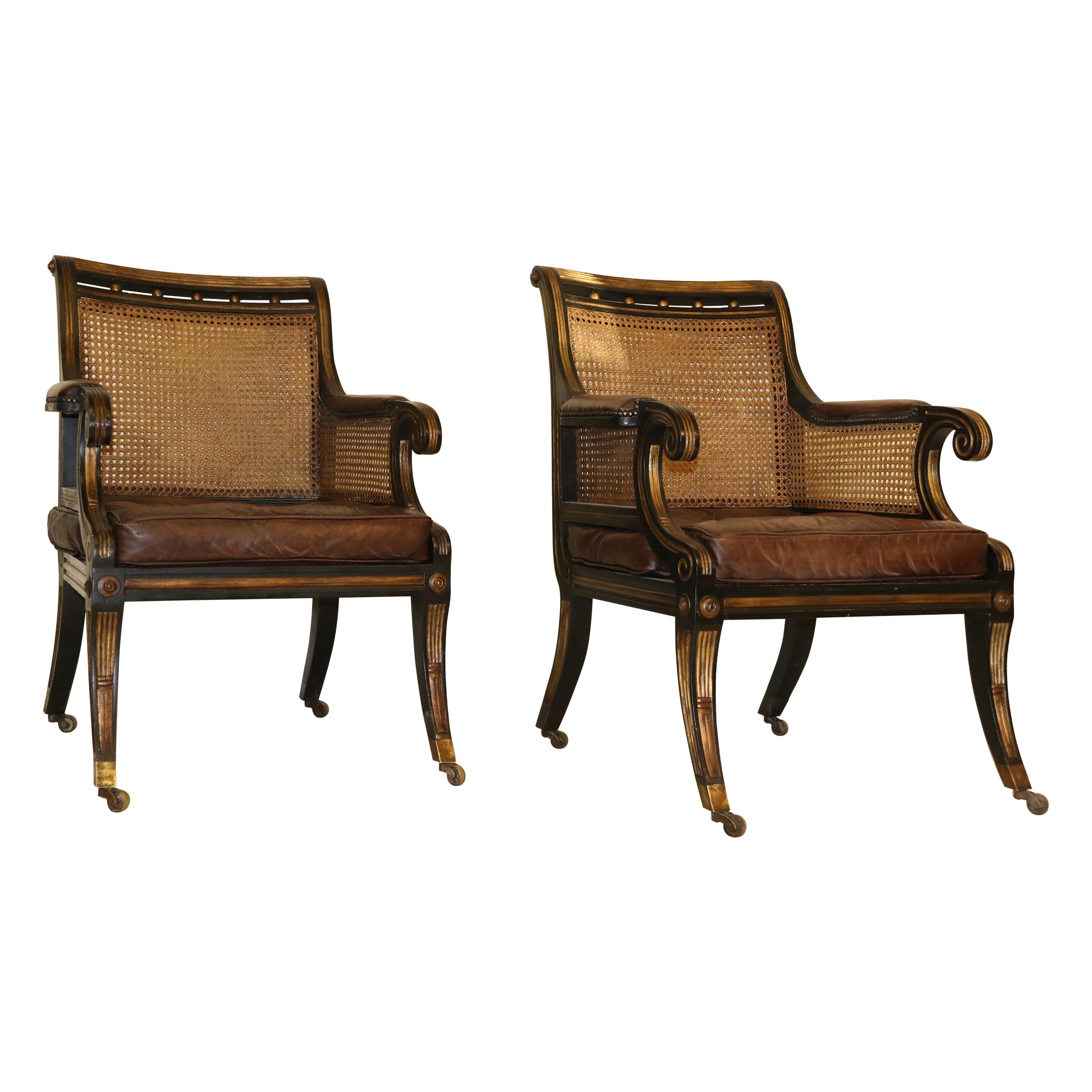 Pair of English Regency Style Ebonized and Gilt Library Chairs For Sale