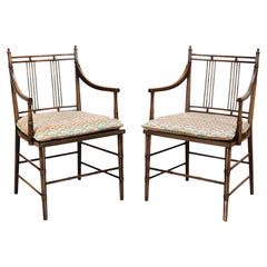 Pair of English Regency Style Faux Bamboo Painted Armchairs with Cane Seats