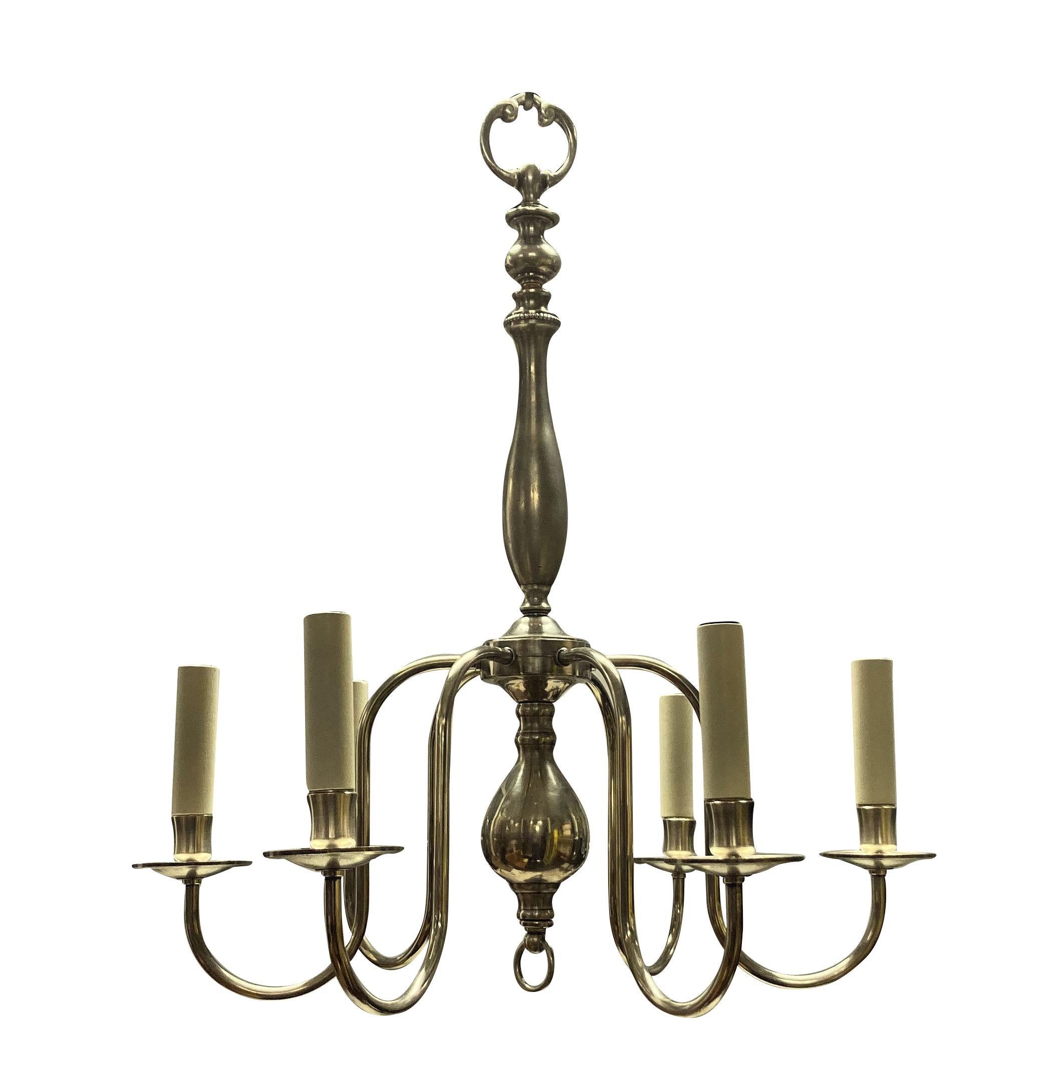 A pair of English silver plated six branch chandeliers, of simple linear design.