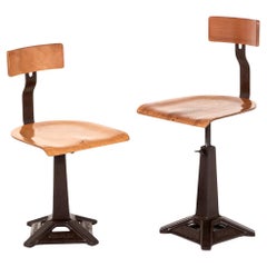 A pair of English Singer Machinist Work chairs