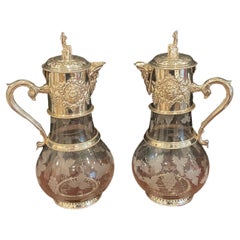 Used A Pair of English Sliver Plated and Engraved Glass Claret Jugs