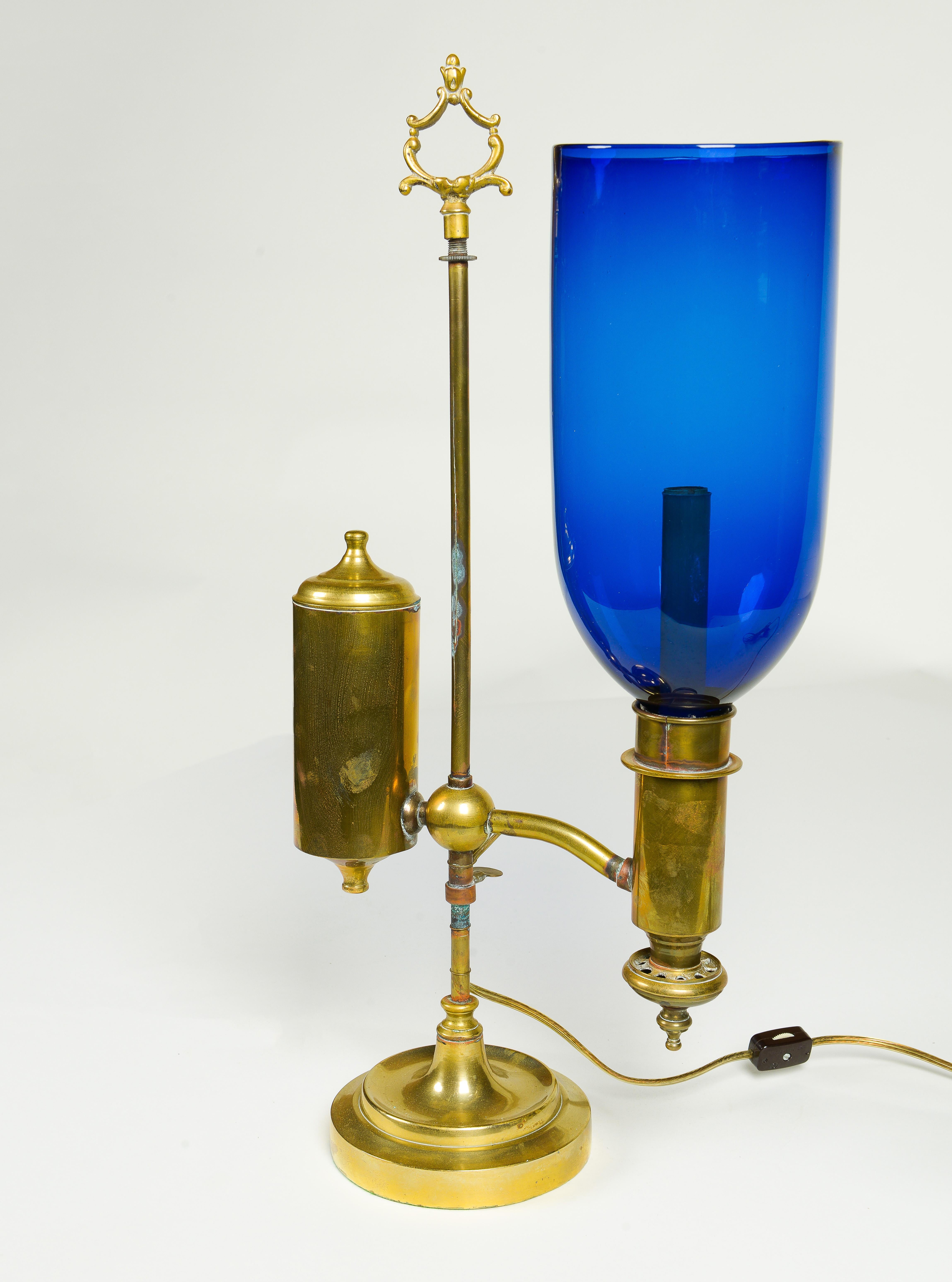 A Pair of English Student Brass Lamps with Blue Hurricane Shades 2