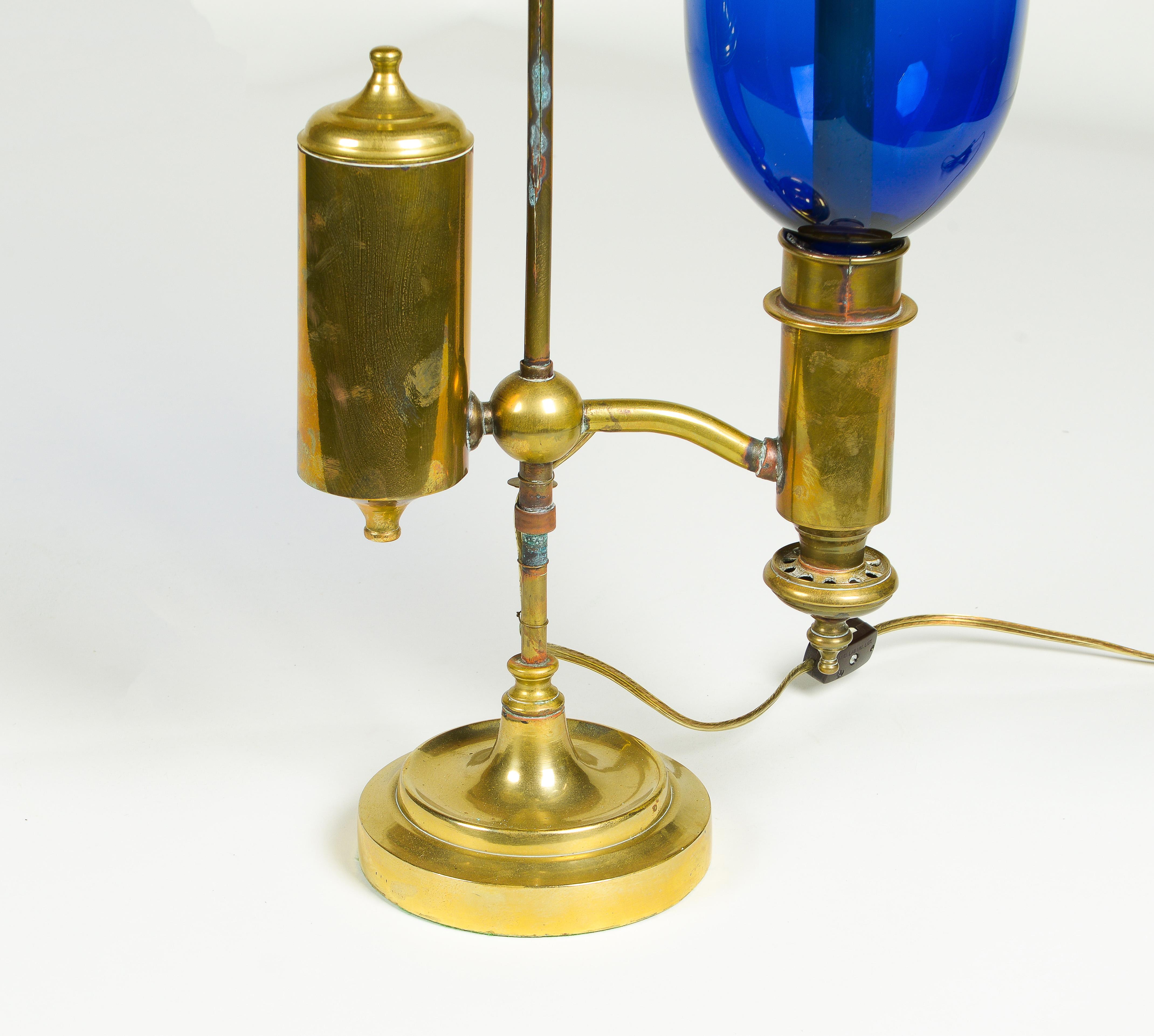 A Pair of English Student Brass Lamps with Blue Hurricane Shades 3