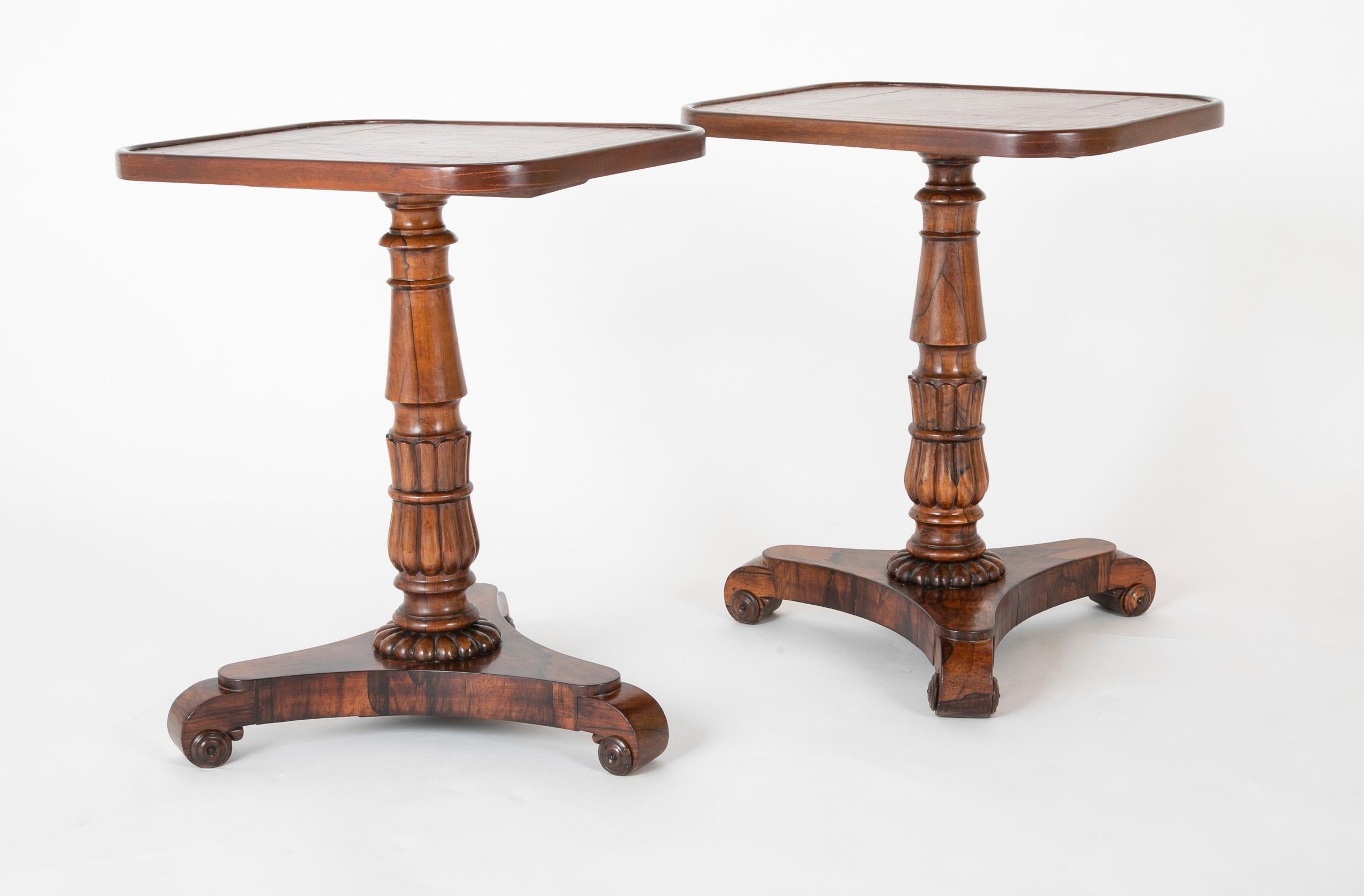 A pair of William IV gold tool leather top rosewood cocktail tables. English, circa 1840. Both tables with restorations.