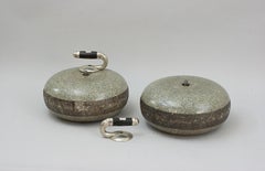 A Pair Of Engraved Curling Stones